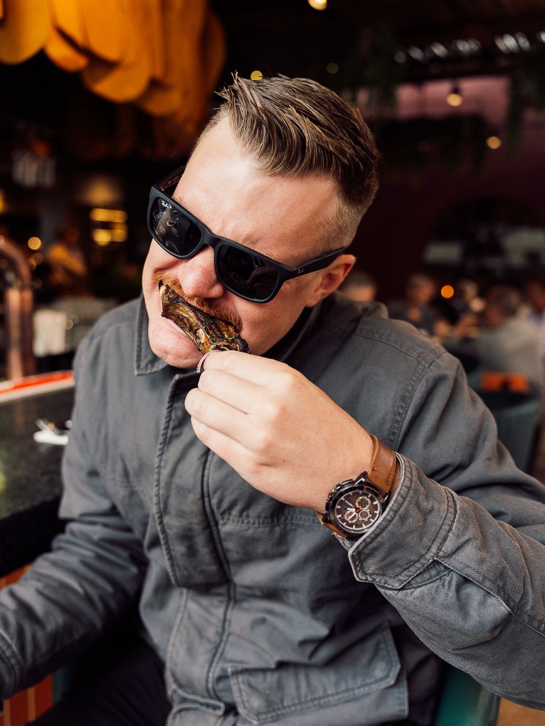 Guest tucking into a wood-fired rib